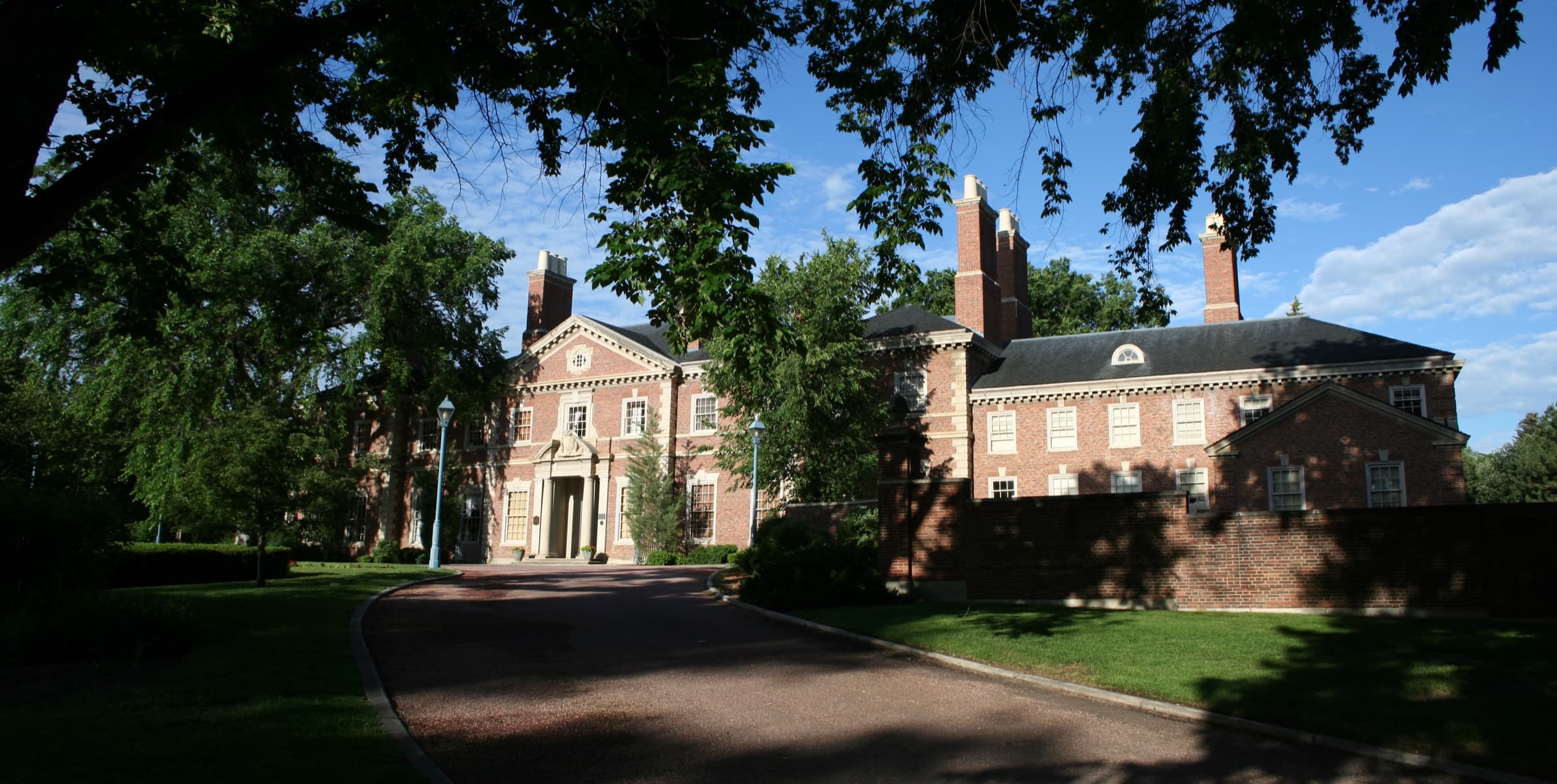The Georgian-style Phipps Mansion, the estate that gave Belcaro its name, at the end of its curving drive in Denver